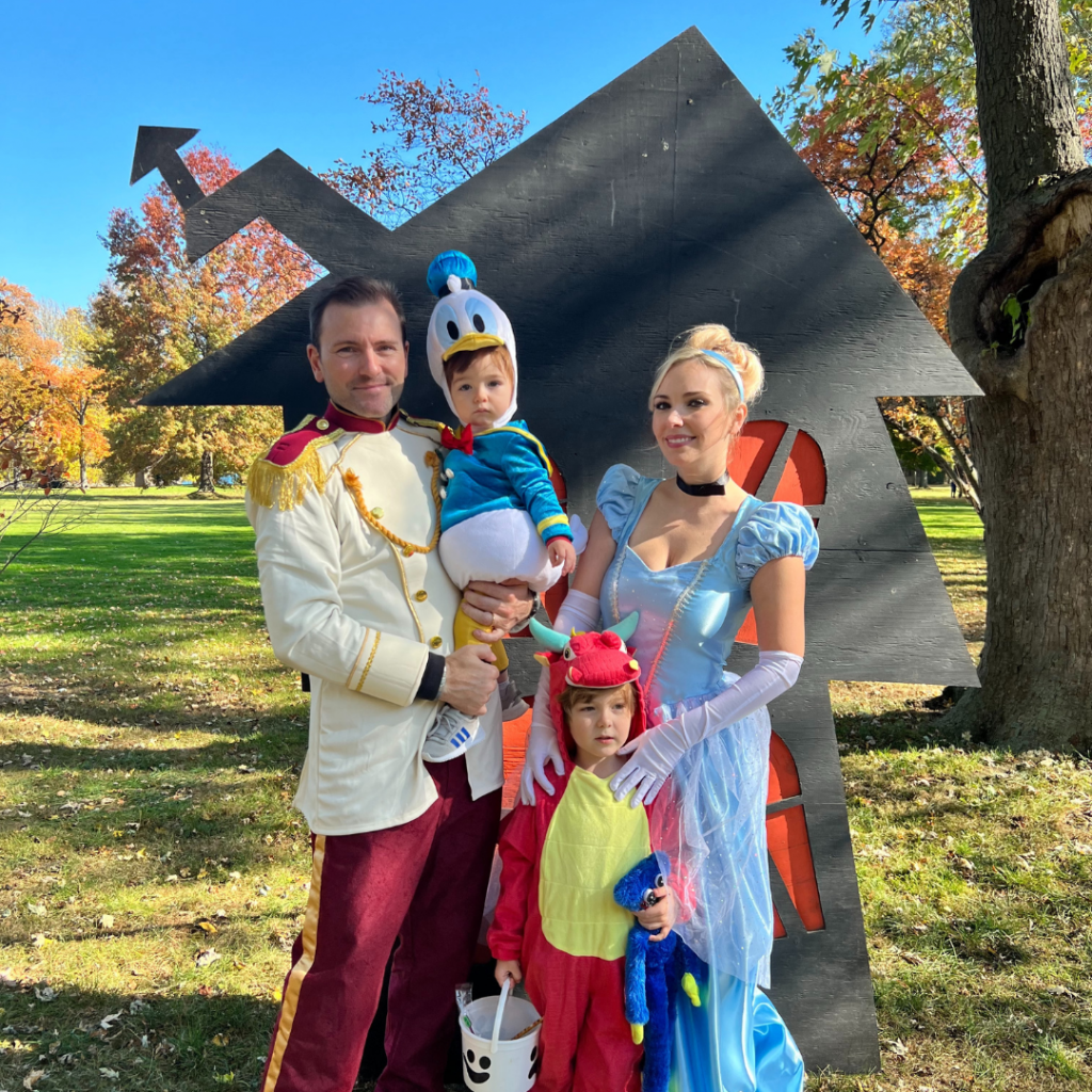 A family is dressed as Disney characters.